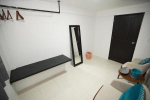 Postel nebo postele na pokoji v ubytování Downtown Hostel Chetumal