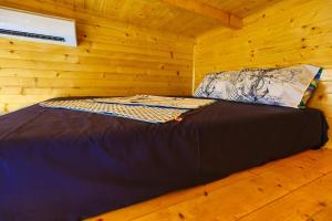 Postel nebo postele na pokoji v ubytování Tramontana Glamping