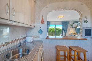 Kuchyň nebo kuchyňský kout v ubytování Beach Apartment Las Acacias Torrenueva