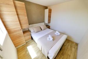 Ένα ή περισσότερα κρεβάτια σε δωμάτιο στο Camp Lostura Slanica