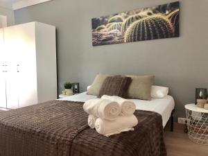 Cama o camas de una habitación en Apartamento Ana Isabel Herrero