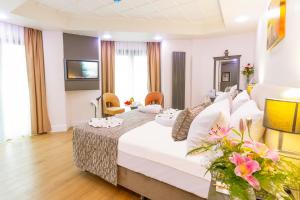 Postel nebo postele na pokoji v ubytování Antusa Design Hotel & Spa