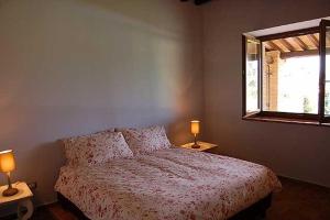 Krevet ili kreveti u jedinici u objektu Casavacanze Sant'Eugenia