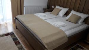 Posteľ alebo postele v izbe v ubytovaní Mateo Transalpina