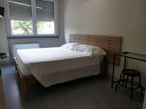 Postel nebo postele na pokoji v ubytování Residence Campo Rotondo