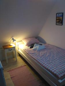 Posteľ alebo postele v izbe v ubytovaní DOKA HÁZ