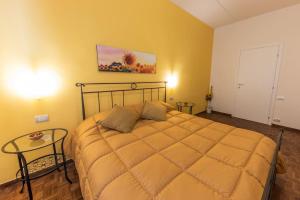 Letto o letti in una camera di Downtown Bologna Apartment