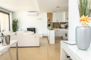 Kuchyň nebo kuchyňský kout v ubytování Apartaments Delfin