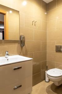 Koupelna v ubytování Apartaments Delfin