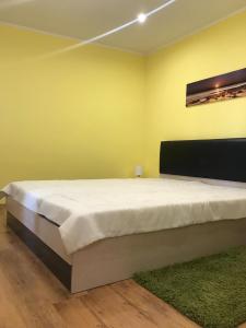 Una cama o camas en una habitación de Къща за гости Зорница