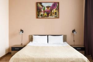 Voodi või voodid majutusasutuse Nika Apart Hotel toas