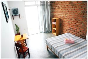 Postel nebo postele na pokoji v ubytování ATMA Hostel & Yoga