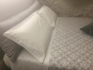A bed or beds in a room at Dimora Le Zagare
