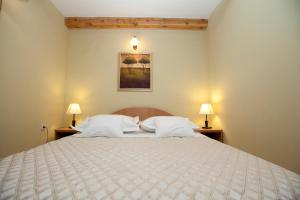 Säng eller sängar i ett rum på Villa Donna