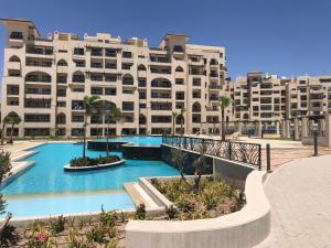The swimming pool at or close to AlDau Heights Apartments