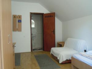 Postel nebo postele na pokoji v ubytování Apartmani Sobe BILJANA