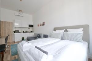 Posteľ alebo postele v izbe v ubytovaní Standard Apartment by Hi5 - Anker 1