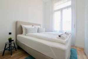 Posteľ alebo postele v izbe v ubytovaní Standard Apartment by Hi5 - Anker 1