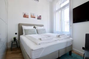 Posteľ alebo postele v izbe v ubytovaní Standard Apartment by Hi5 - Anker 1