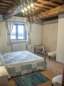 Een bed of bedden in een kamer bij San Fedele Alloggi