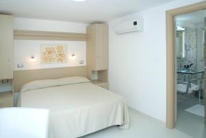 Postel nebo postele na pokoji v ubytování B&B Ala Marina
