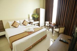 Postel nebo postele na pokoji v ubytování Anova 2 Hotel