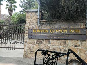 a sign for the huntington canyon canyon park at Hollywood La Brea Inn in Los Angeles