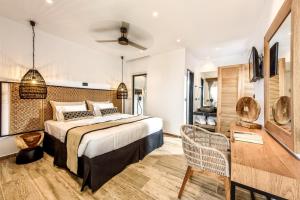 Postel nebo postele na pokoji v ubytování Aggello Boutique Hotel + 37 fotografií