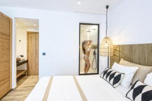 Postel nebo postele na pokoji v ubytování Aggello Boutique Hotel