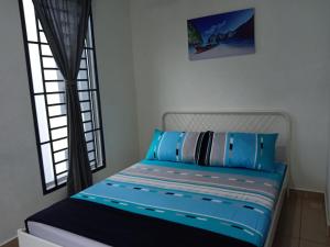 Katil atau katil-katil dalam bilik di Casuarina Sea Breeze Desaru