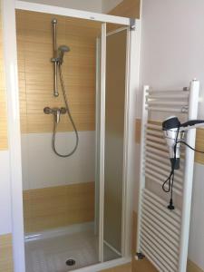 a shower with a glass door in a bathroom at Il Pozzo in San Benedetto del Tronto