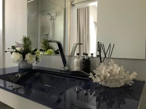 Dapur atau dapur kecil di Levante Holiday Apartments