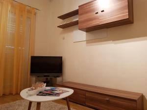 TV a/nebo společenská místnost v ubytování Apartment M&M