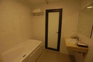 Koupelna v ubytování Anova 2 Hotel
