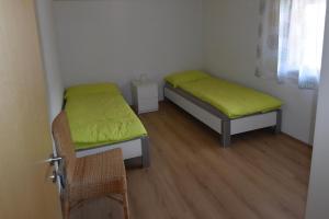 Postel nebo postele na pokoji v ubytování Ferienwohnung Gemeindematte