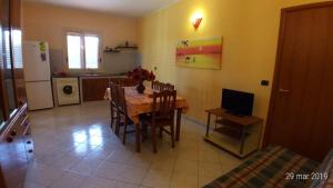 Kuchyň nebo kuchyňský kout v ubytování Siracusa Solemare