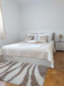 Postel nebo postele na pokoji v ubytování Apartman Jurilj
