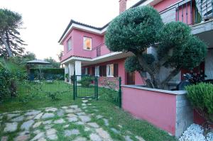Κήπος έξω από το Casa Rossa Apartment