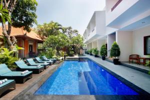 an image of a swimming pool in a hotel at Nesa Sanur Bali in Sanur