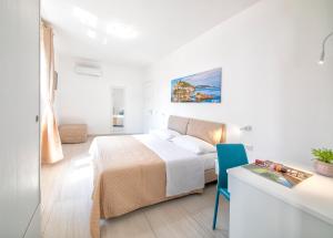 Postel nebo postele na pokoji v ubytování B&B La Gioia