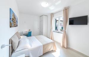 Postel nebo postele na pokoji v ubytování B&B La Gioia
