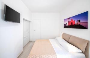 TV a/nebo společenská místnost v ubytování B&B La Gioia
