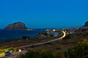 a view of a road in a city at night at Paraschou Guesthouse in Monemvasia