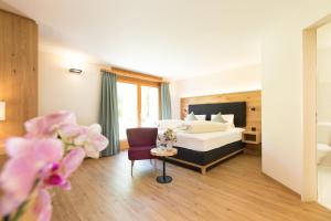 Postel nebo postele na pokoji v ubytování Boutique-Hotel Vincenz