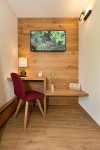 TV a/nebo společenská místnost v ubytování Boutique-Hotel Vincenz