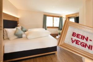 Postel nebo postele na pokoji v ubytování Boutique-Hotel Vincenz