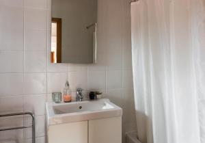 Ванная комната в Casa De Janeiro