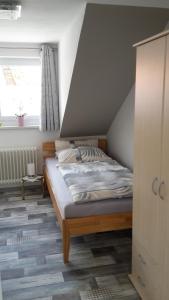 Ferienwohnung Schönblick tesisinde bir odada yatak veya yataklar