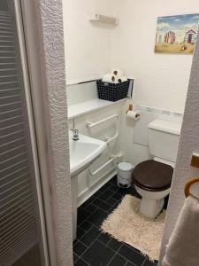 Ванная комната в Sarnia holiday flats