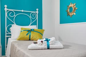 A bed or beds in a room at Il Piccolo Principe Affittacamere